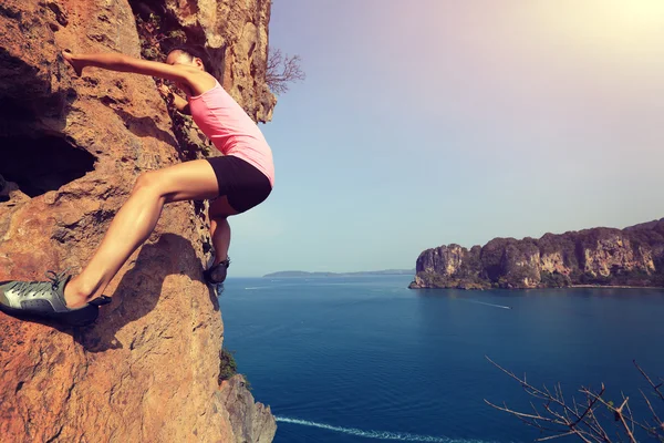 Woman rock climber