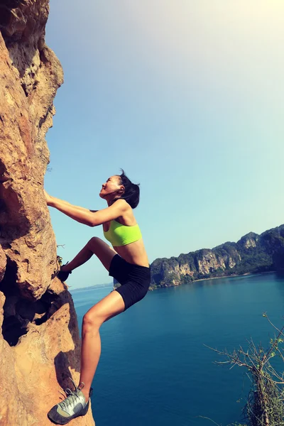 Woman rock climber