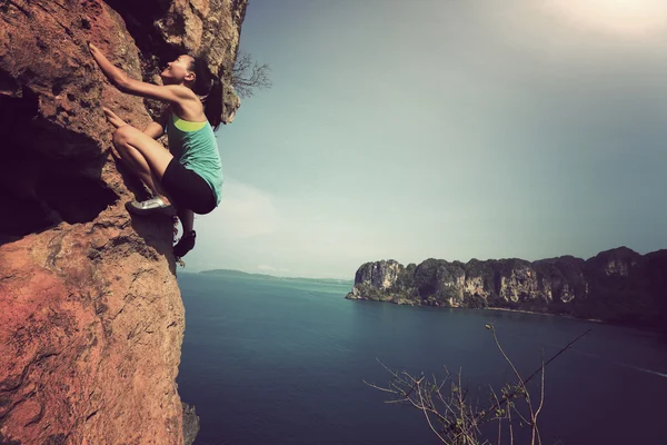 Woman rock climber