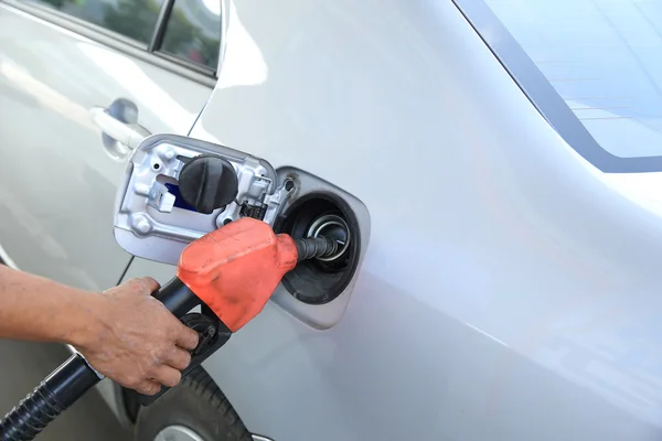 Refueling car with gasoline