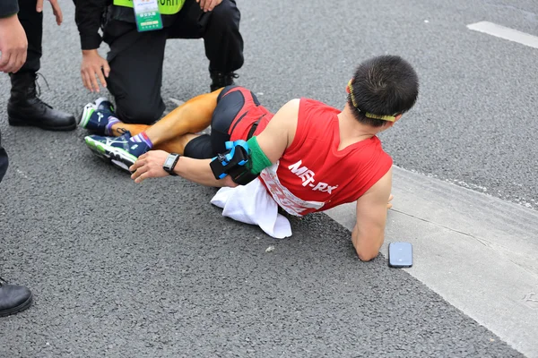 Injured marathon runner