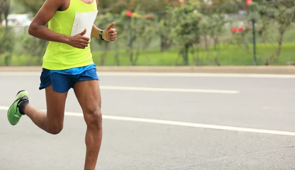 Marathon runner on road