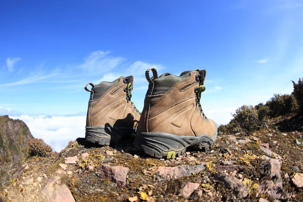 Hiking boots on  mountain peak