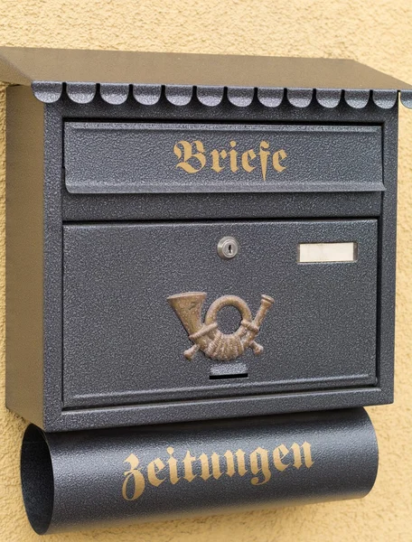 Mailbox and newspaper holder made of metal