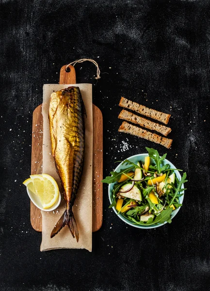 Smoked mackerel, fresh salad, croutons on black from above