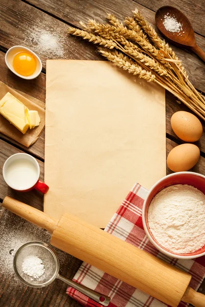 Baking cake ingredients in rustic kitchen - top view