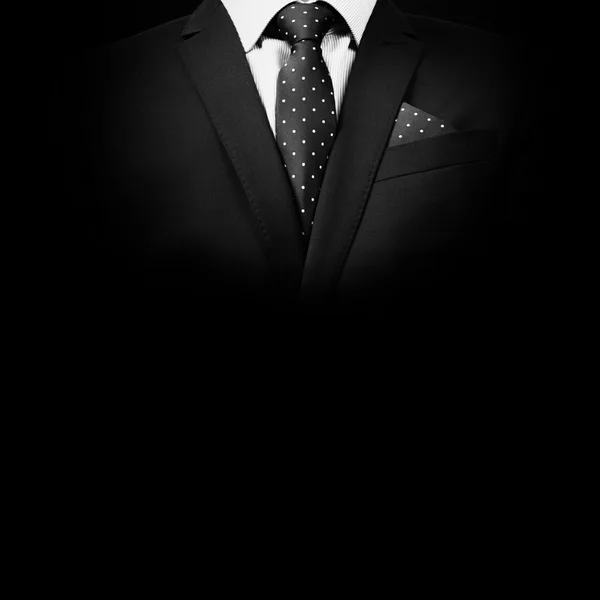 Man in suit on a black background - Stock Image - Everypixel