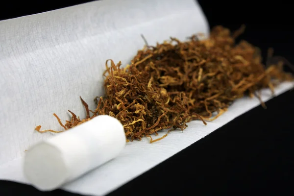 Tobacco with filter tip and paper