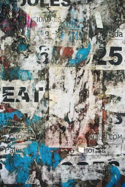 Random collage texture paper on eroded wall with eat word