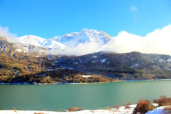 Mountains lake in Pyrenees, winter, spring