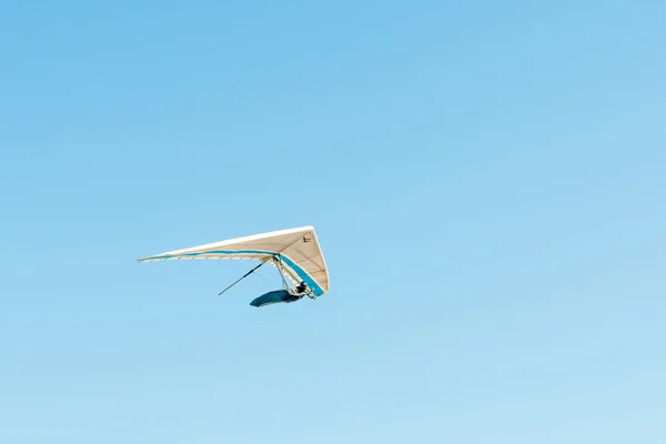 Hang glider in the air