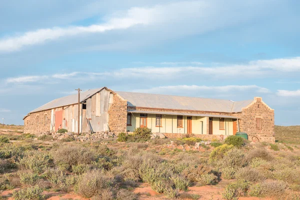 Old school building at Wallekraal at sunset