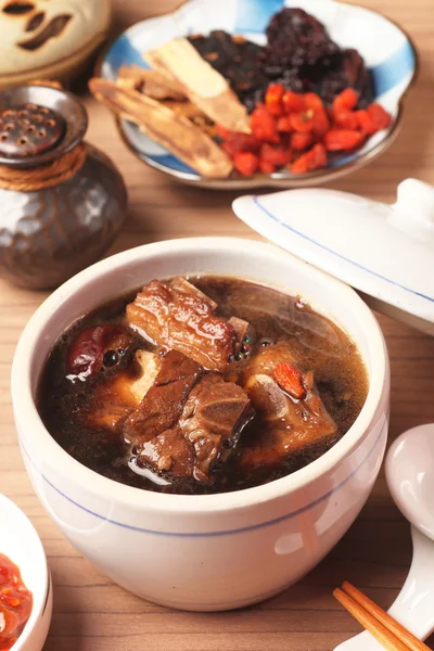 Pork chops in Chinese medicine soup.