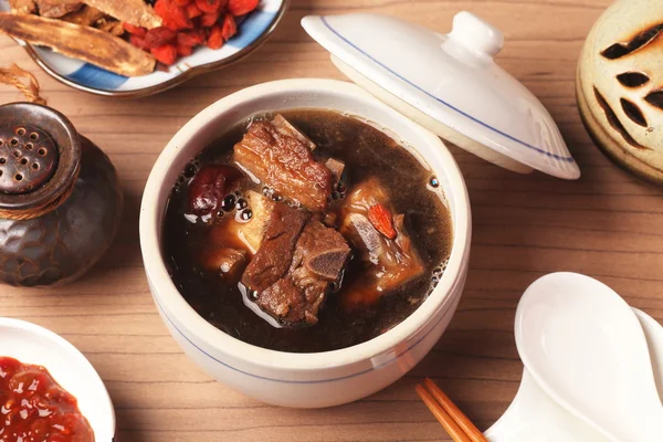 Pork chops in Chinese medicine soup.