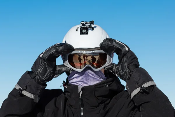 Skier with goggles and ski helmet