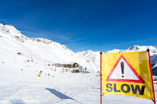 Yellow slow down warning sign