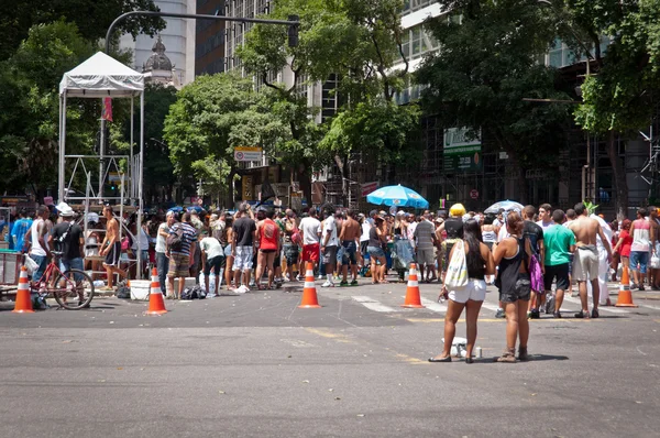 Revellers in costumes take over the streets of the city center in Rio\'s largest carnival