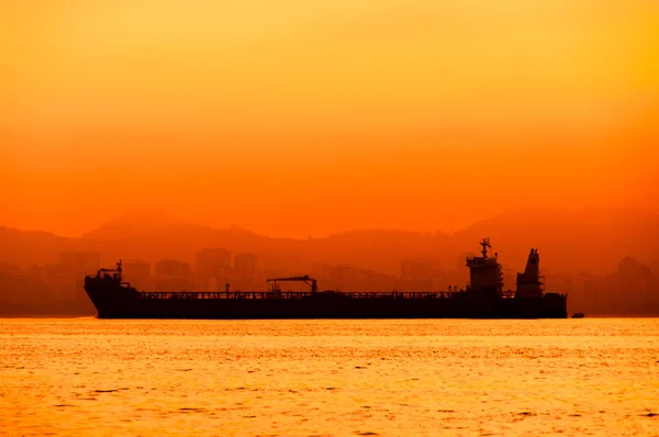 Silhouette of large industrial ship