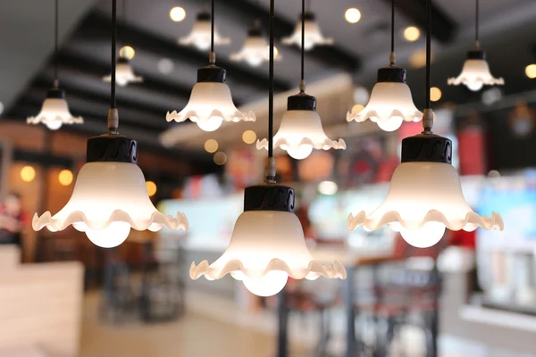 Warm lighting modern ceiling lamps in the cafe.