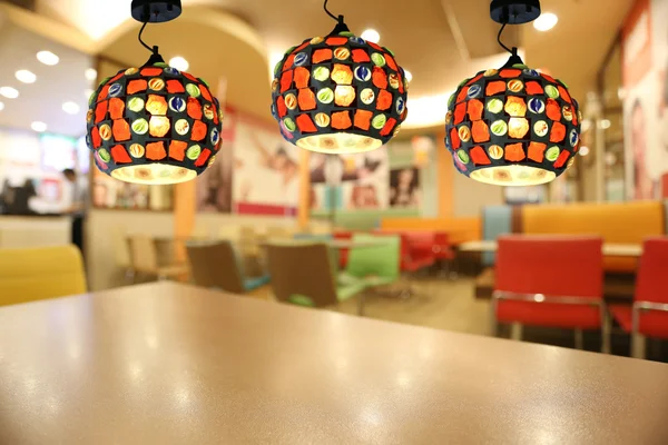 Warm lighting modern ceiling lamps in the cafe.