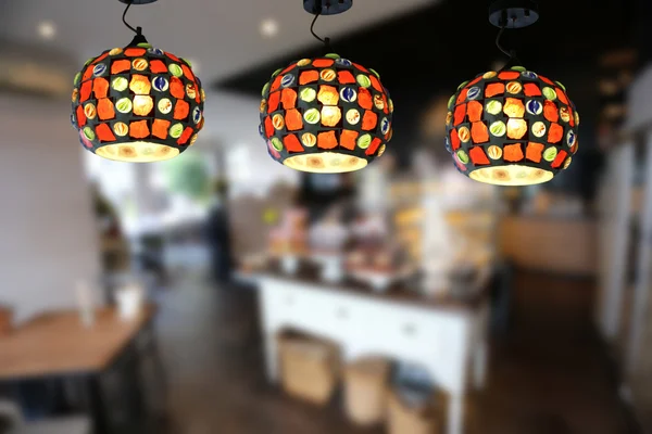 Warm lighting modern ceiling lamps in the cafe.