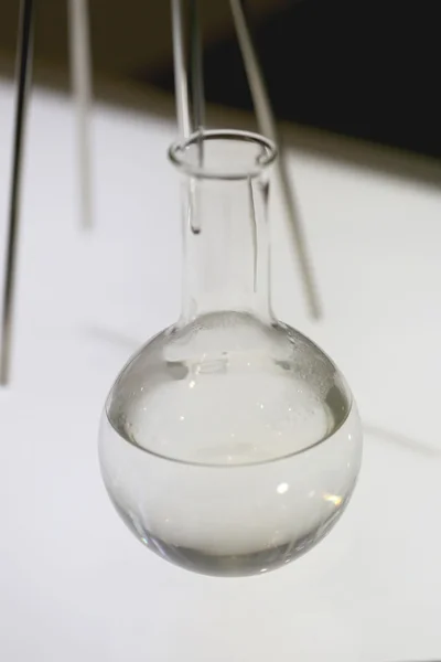 Glass bottles used in chemistry experiments.