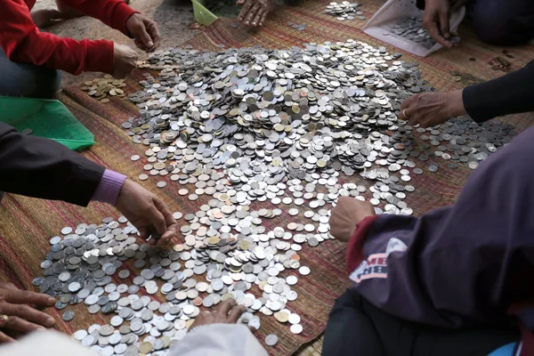 Counting coins.