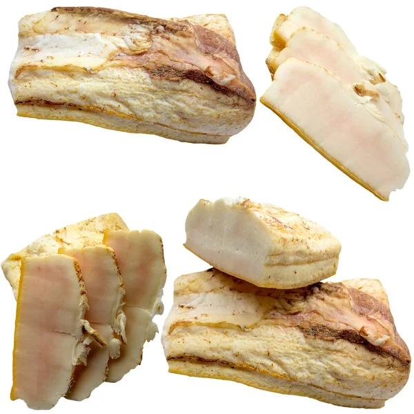 Pieces of crude fat of pork are isolated on a white background.