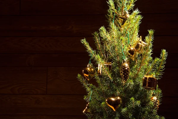 Spruce with golden decoration