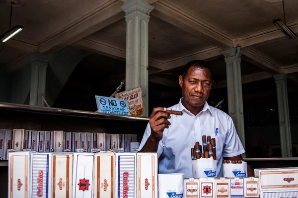 A tobacco and cigar shop owner in Old Havana