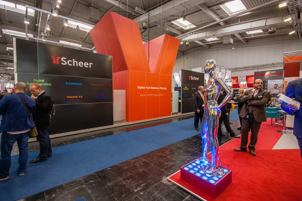 HANNOVER, GERMANY - MARCH 14, 2016: Booth of Scheer company at CeBIT information technology trade show in Hannover, Germany on March 14, 2016
