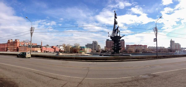 MOSCOW, RUSSIA - MARCH 24, 2015: Panoramic view of embankment Moscow river with the Peter the Great monument, hotel President and Red October office center in Moscow, Russia on March 24, 2015.