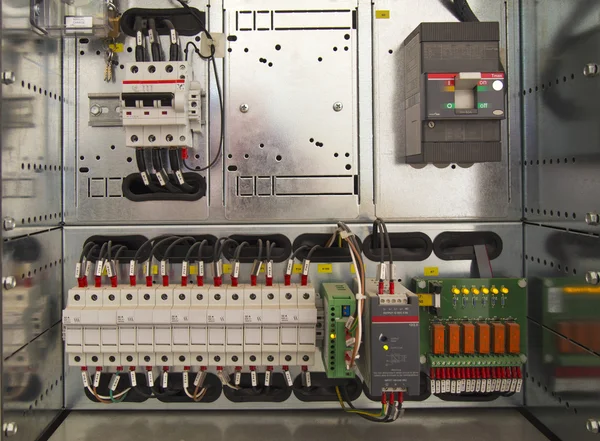 Relay cubicle with components and wires