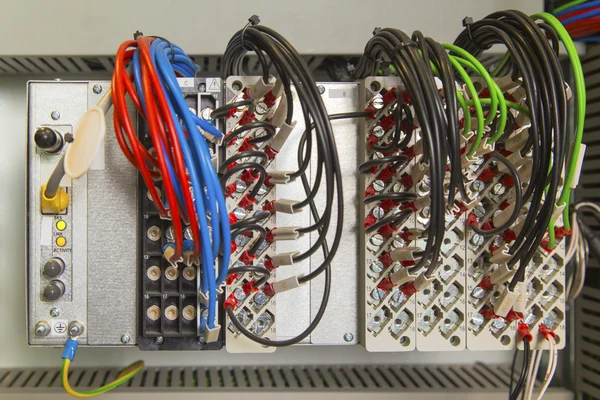 Relay protection device with terminals and wires