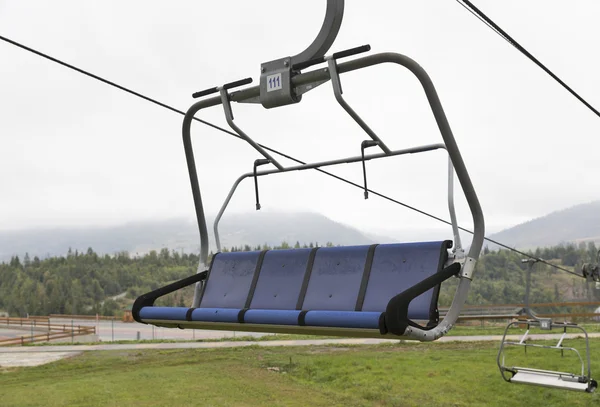 Skiing lift chair in the fall