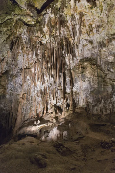 Cave inside with stalactites and stalagmites