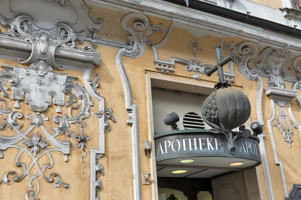 Old pharmacy Zum Granatapfel building facade in Graz, Austria.