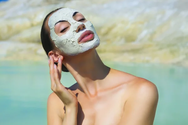 Woman with Blue Clay Facial Mask. Beauty and Wellness. Spa Outdo