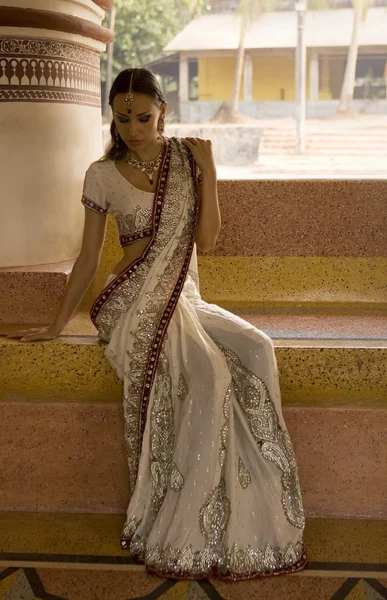 Beautiful young indian woman in traditional clothing with bridal