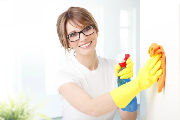 Woman cleaning  surface