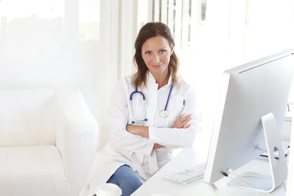 Doctor sitting at private clinic