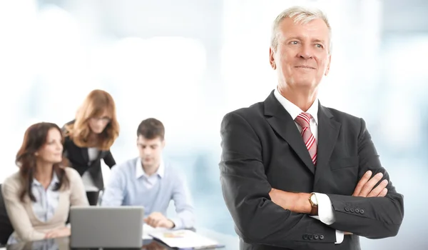 Executive businessman standing at office