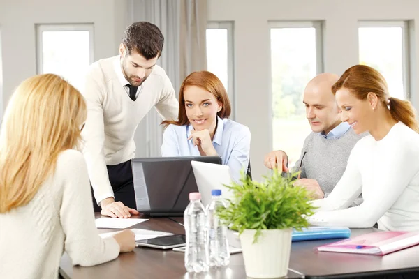 Business people sitting at meeting