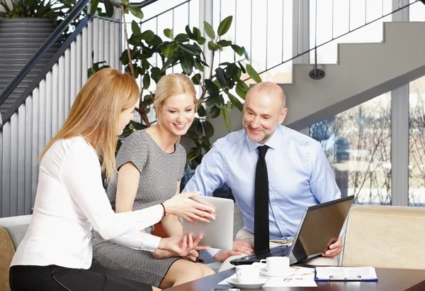 Business people sitting at interview