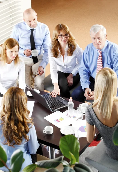 Business people sitting at meeting