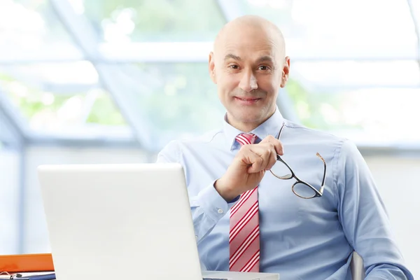 Sales man sitting at office