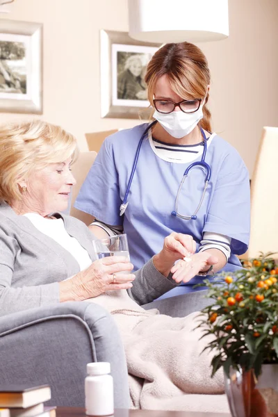Patient sitting  with home care nurse