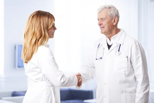 Doctors shaking hands