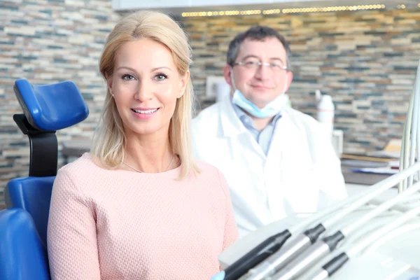 Woman sitting at dentist office