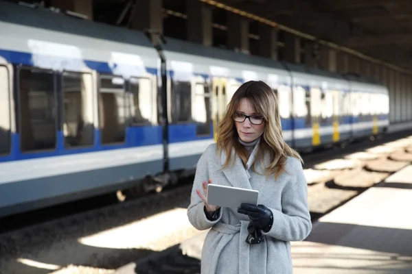 Woman hecking the online schedule